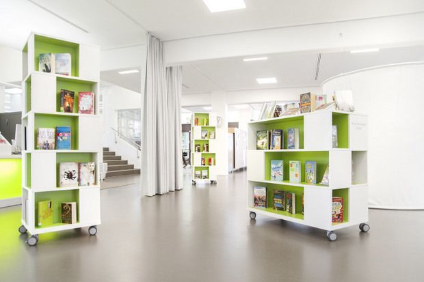 Labyrinth Book Tower - BCI Libraries | Modern library furniture, Library  furniture, Slat wall display